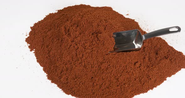 Star Anise illicium verum,, spice falling on Powder of Star Anise against White Background alt