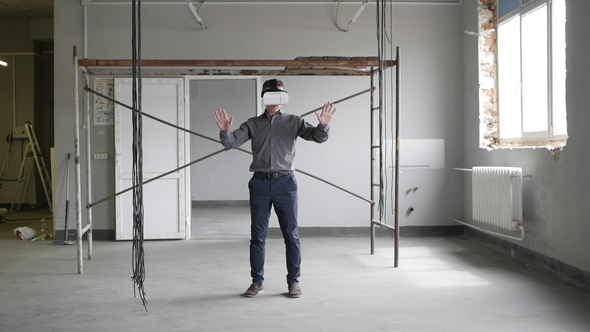 Man Uses Virtual Reality Glasses