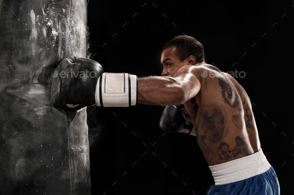 Boxing training and punching bag - Stock Photo - Images