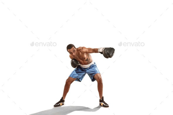 Sporty man during boxing exercise. Photo of boxer on white background - Stock Photo - Images