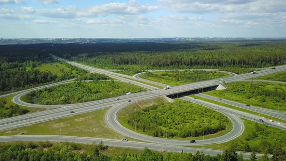 Aerial Shot Traffic on the Road with a Transport Interchange alt