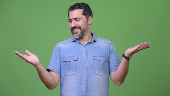 Handsome Persian Bearded Man Choosing Between Left and Right