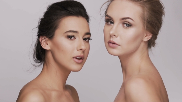 Cute Girls Posing at Studio Background