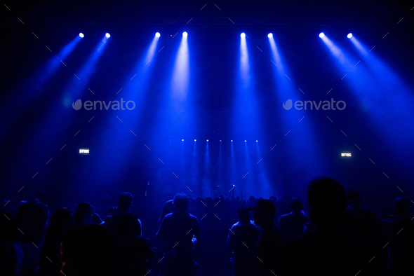 Download Stage Lights And Silhouette Of Crowd At Concert Stock Photo By Salajean