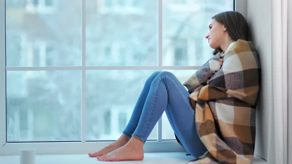 Pensive Barefoot Woman Shrink From Cold and Bundle Up Warmer on Plaid alt