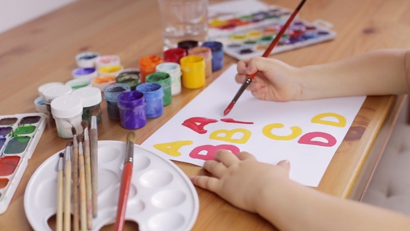 Preschooler Learn How To Write Letters. Education Concept