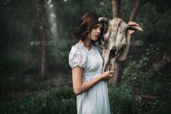 Victim with skull of the animal instead of head - Stock Photo - Images