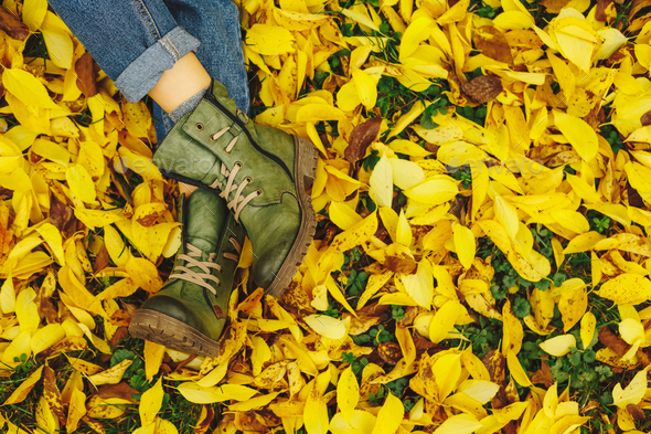 Shoes in yellow autumn leaves - Stock Photo - Images