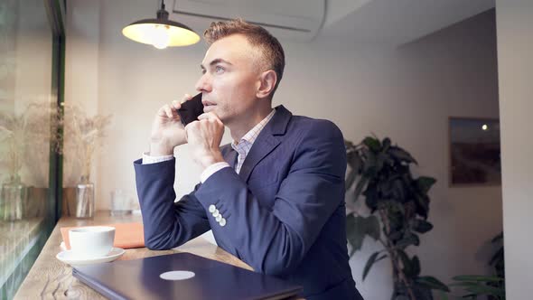 Man talking on the phone.