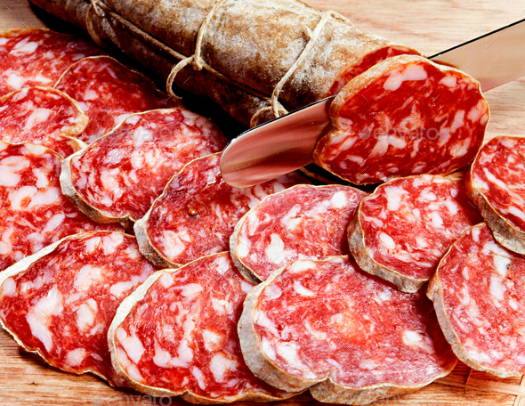 Sliced fresh spicy Italian salami - Stock Photo - Images