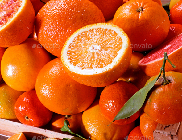 Close up on an assortment of fresh citrus fruit - Stock Photo - Images