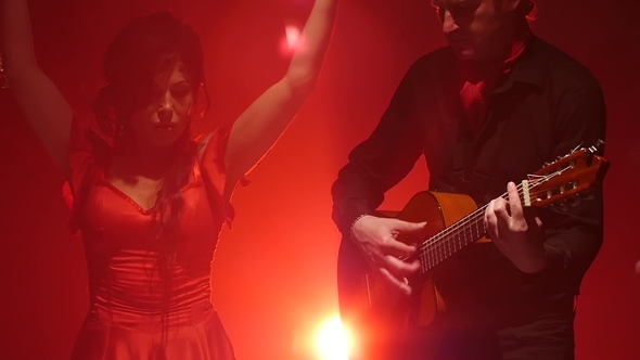 Girl Dancing Flamenco . Light From Behind. alt