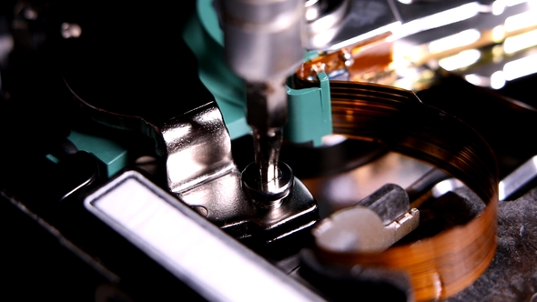 Unscrewing Hard Disk Bolts alt