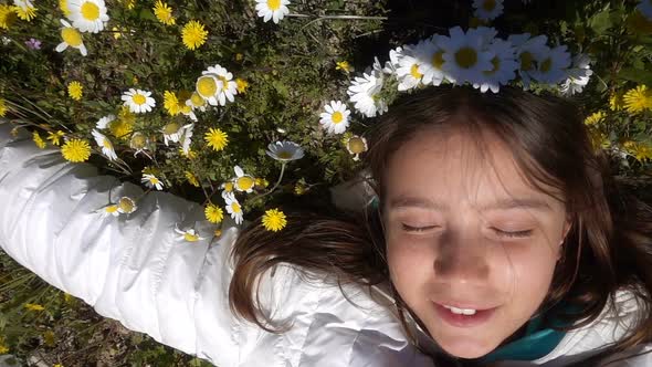 Young Girl On Daisy Flowers 2