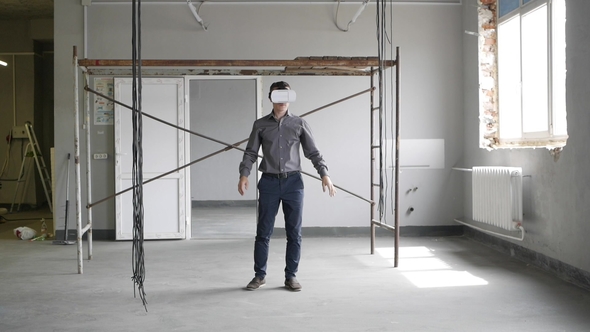 Man Uses Virtual Reality Glasses