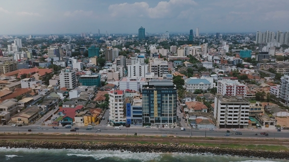 Drone Zooming Out Above Colombo, Sri Lanka Panorama. Aerial View of Asian Resort Town, Modern alt