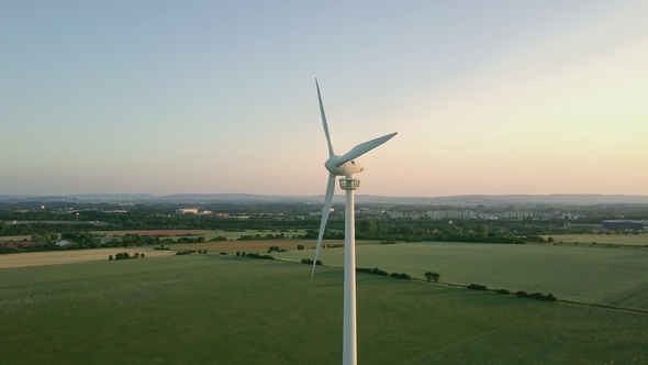 Wind Turbine in Front of Green Fields Wind Power