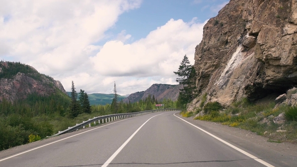 Driving on a Summer Mountain Road