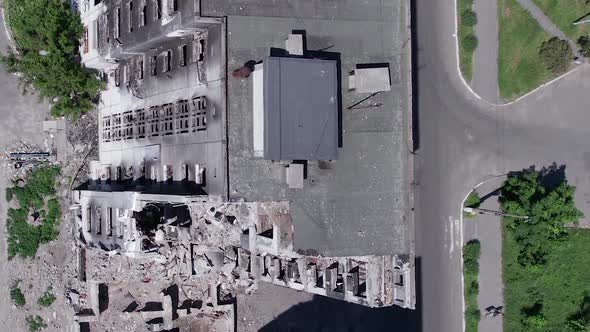 Vertical Video of Civilian Cars Destroyed During the War in Ukraine alt