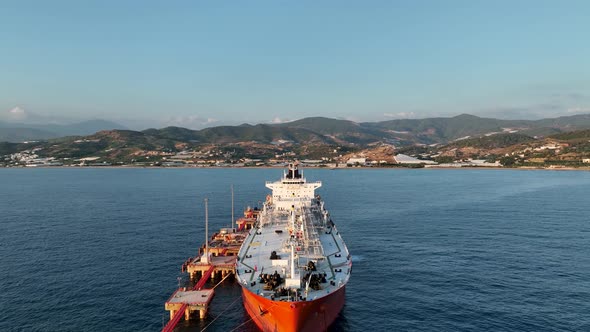 A gas tanker is anchored at sea aerial view 4 K alt