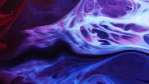 Chemical Liquid Swirl And Paint Reaction Explosion alt
