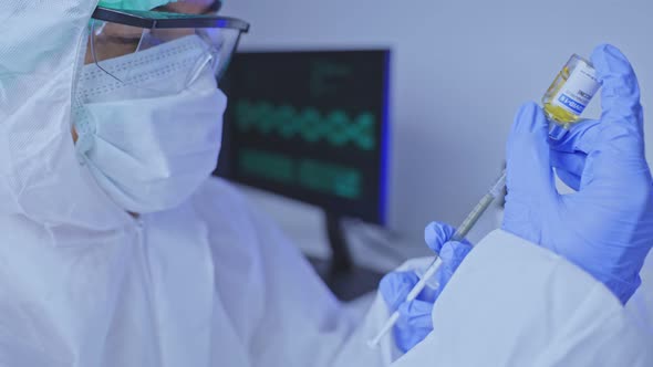 The Coronavirus researched work in laboratory room of covid-19 vaccine and drug manufacturing. alt