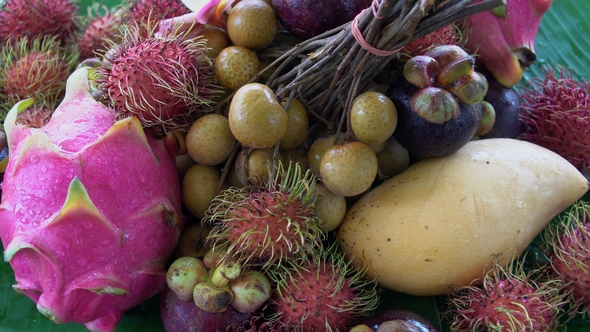 Assortment of Exotic Tropical Thai Fruit Including Rambutan, Dragonfruit, Longan, Mangosteen and alt