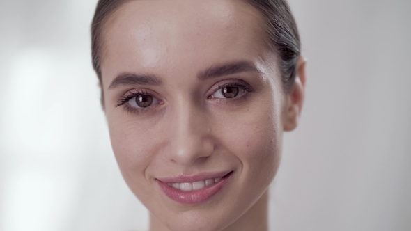 Woman's Face Care. Smiling Female Touching Skin On Face, Stock Footage