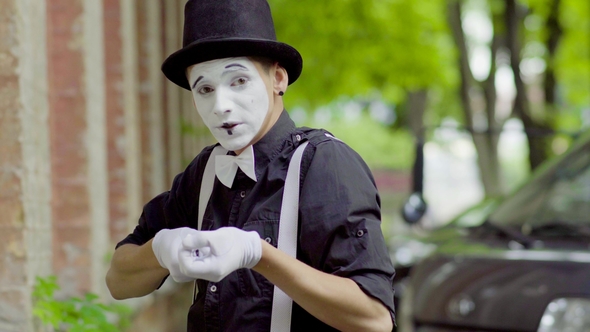 Young Mime Is Fooling Around on the Street, Stock Footage | VideoHive