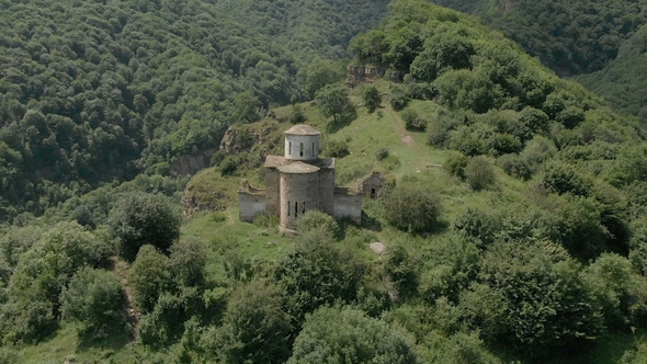 Departure on the Dune Around the Ancient Dilapidated Christian Church Standing High on the Mountain alt