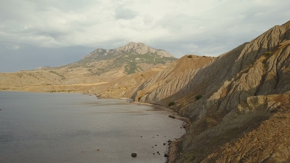 Aerial Shooting of a Beautiful Fox Bay in Crimea. Amazing Aerial Shot of Rock Formation in Crimea alt