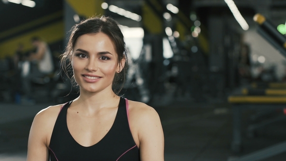 Pretty Brunette Girl at Gym alt