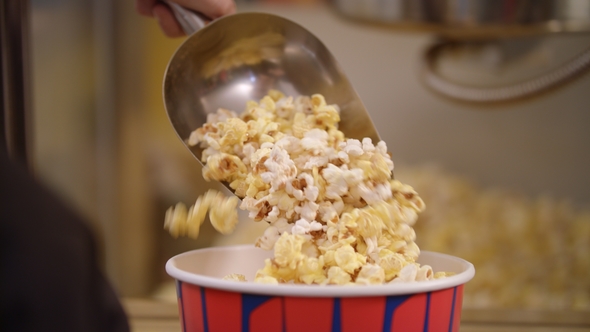 Popcorn Pouring in Container with Ladle, Stock Footage | VideoHive