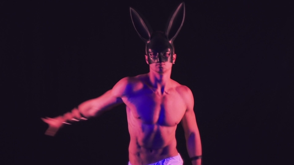 Sexy Man Dance on Black Background alt