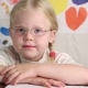 Beautiful Little Girl in Glasses with a Pencil Draws - VideoHive Item for Sale