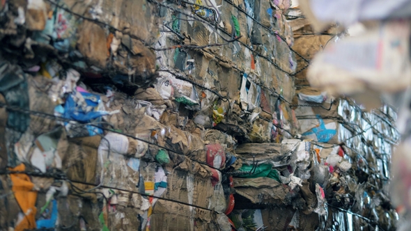 Blocks of Rubbish Contained in a Recycling Facility alt