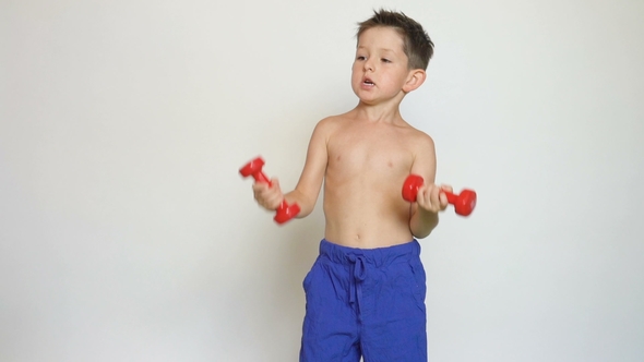 Cute Boy with Dumbbells on White Background