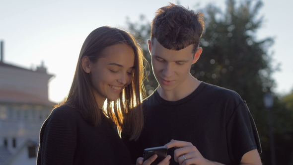 Couple Sharing Media in a Smart Phone