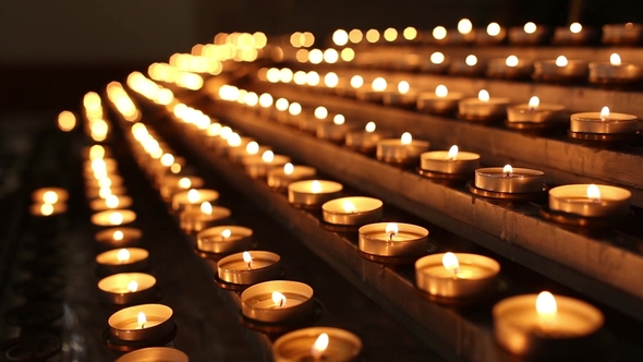 Lighted Candles in the Temple in the Twilight alt