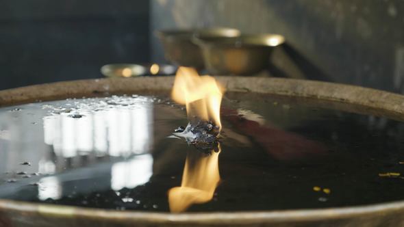 Candle in the Boudhanath. Kathmandu Valley, Nepal alt