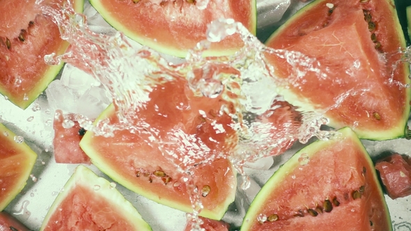 Water Drop on Pieces of Watermelon and Ice Top View