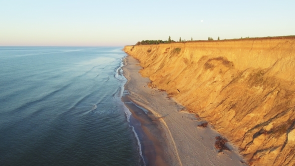 Flying Over the Sea Towards Rising Sun - Aerial Footage Video alt