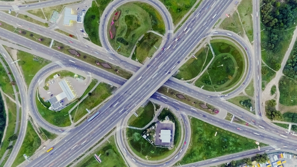 Static Vertical Top Down Aerial View of Traffic on Freeway Interchange at Night.  Background alt