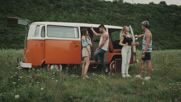 Two Couple Have Fun and Dancing in the Middle of Landscape at Picnic Time , Hip Friends and Retro alt