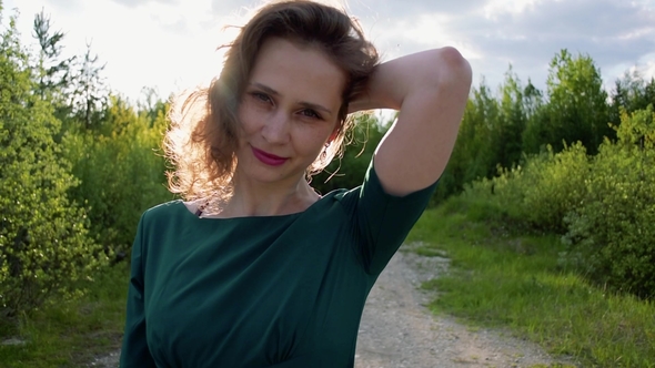 Happy Woman Walking in the Park, Camera Stabilizer Shot
