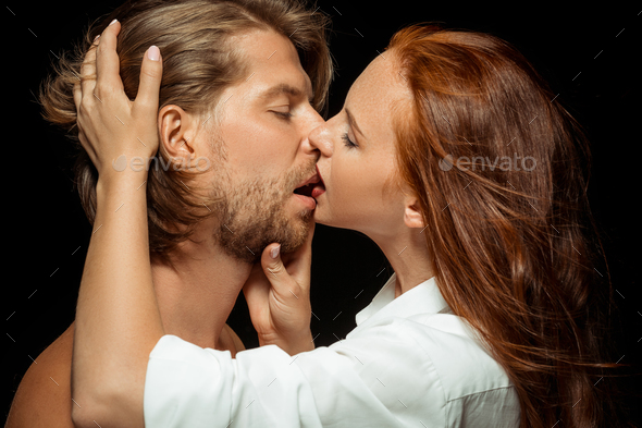 Real passion. Beautiful young loving couple Stock Photo by master1305