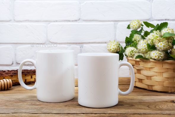 Two coffee mug mockup with basket of flowers Stock Photo ...