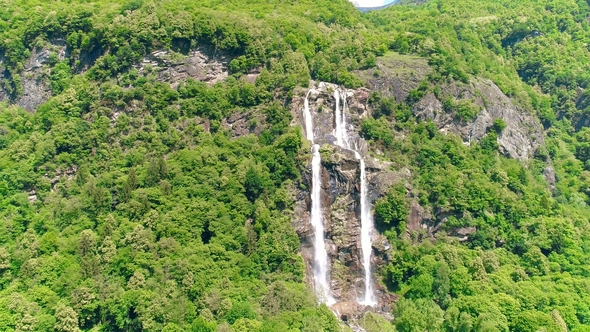 Cinematic  Aerial Veiw a Waterfall in Italy and Austria Alps