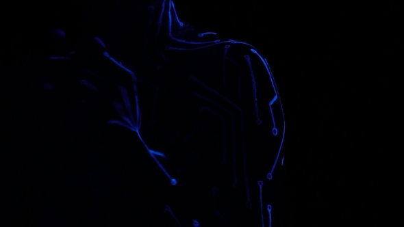 Girl in UV Light with Body Painting on the Body in the Form of Microcircuits alt