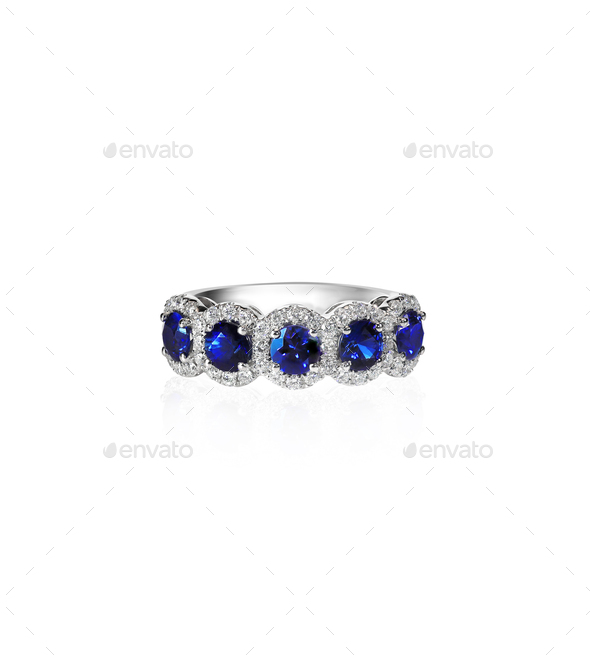 Blue Sapphire and diamond wedding anniversary bridal ring band Stock Photo by fruitcocktail